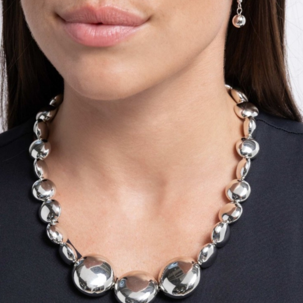 NIB Silvertone necklace with matching earrings